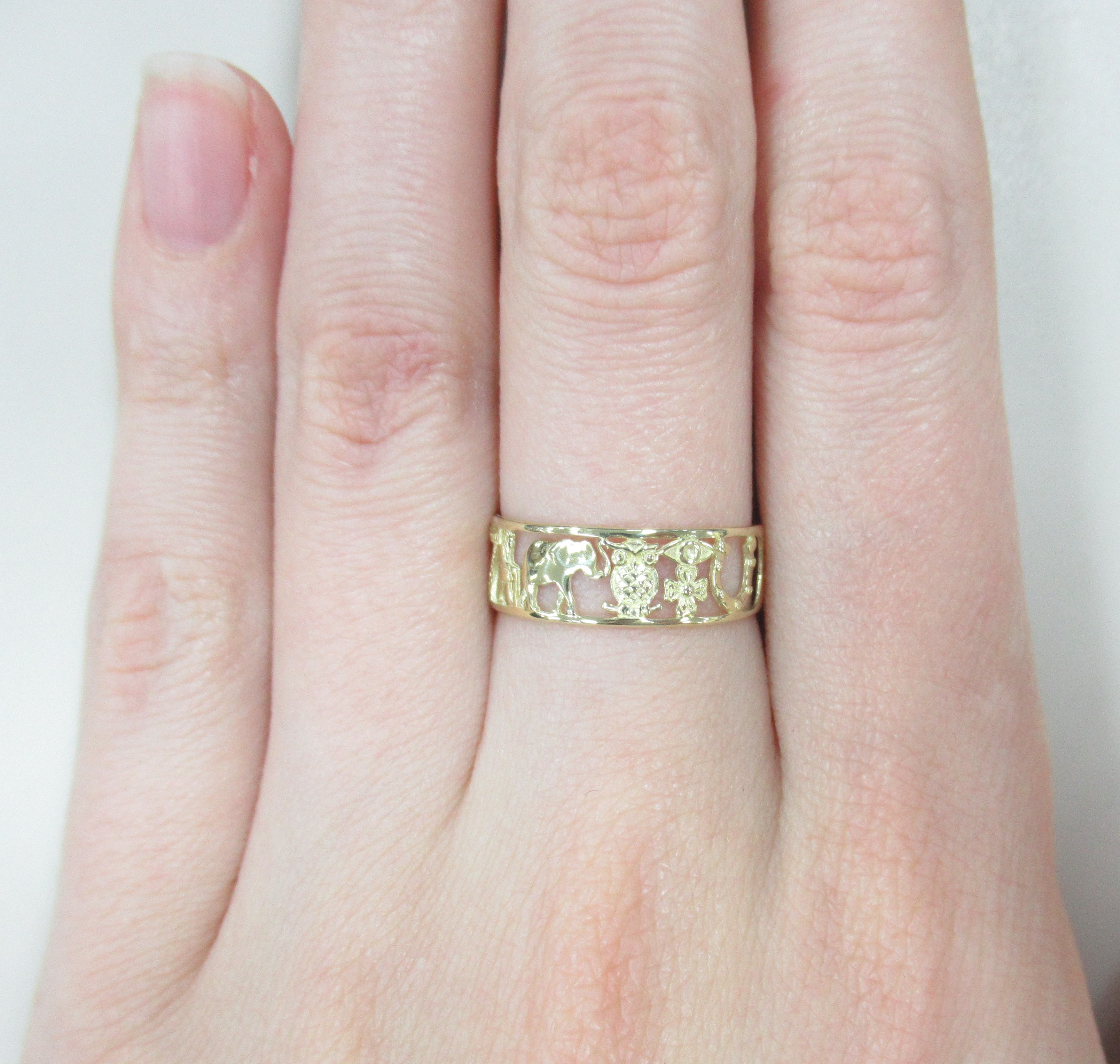 Кольцо из желтого золота "Символы счастья и удачи"